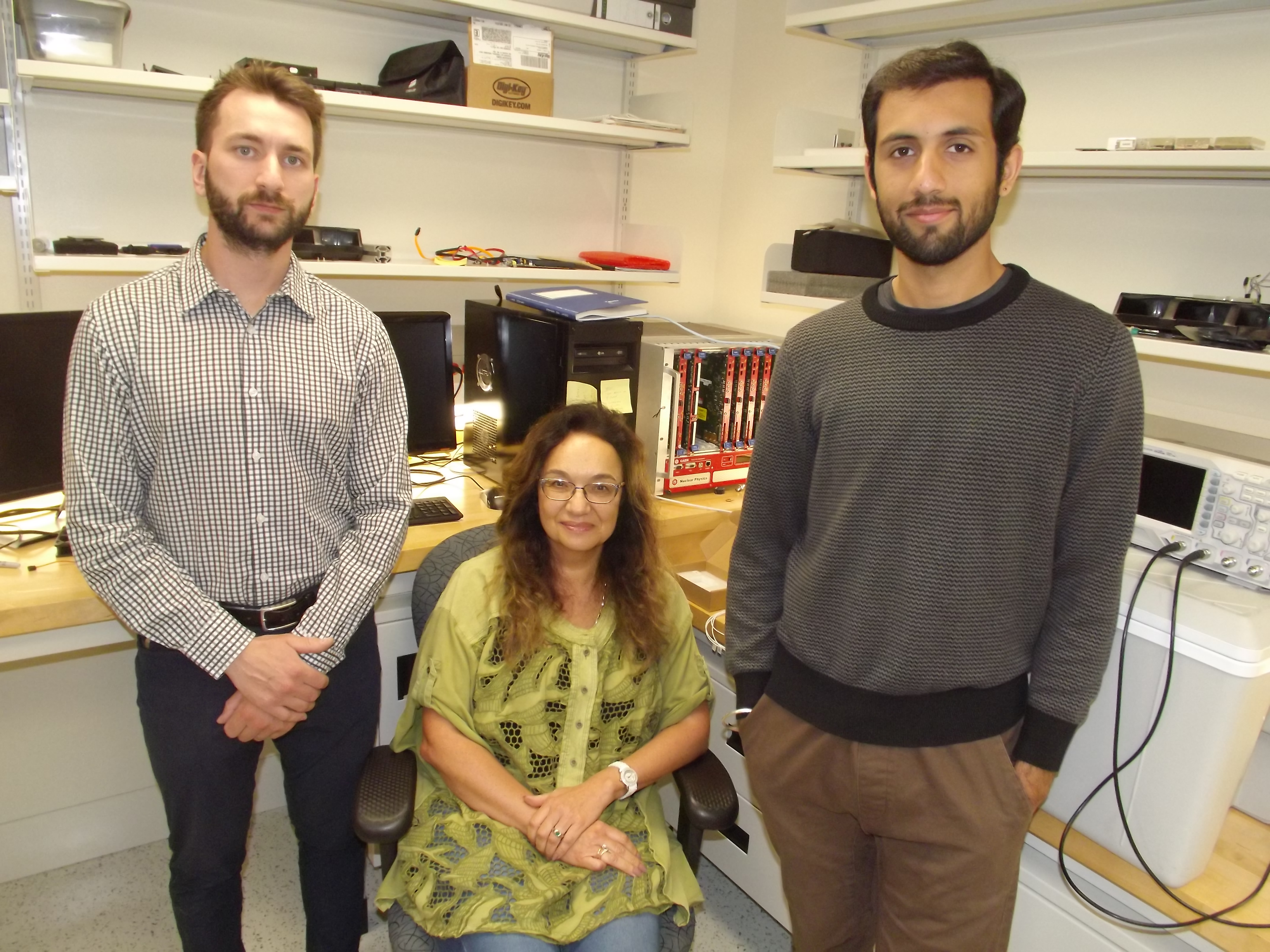 Alla Reznik, Brandon Baldassi, left, and master's student Anirudh Shahi.